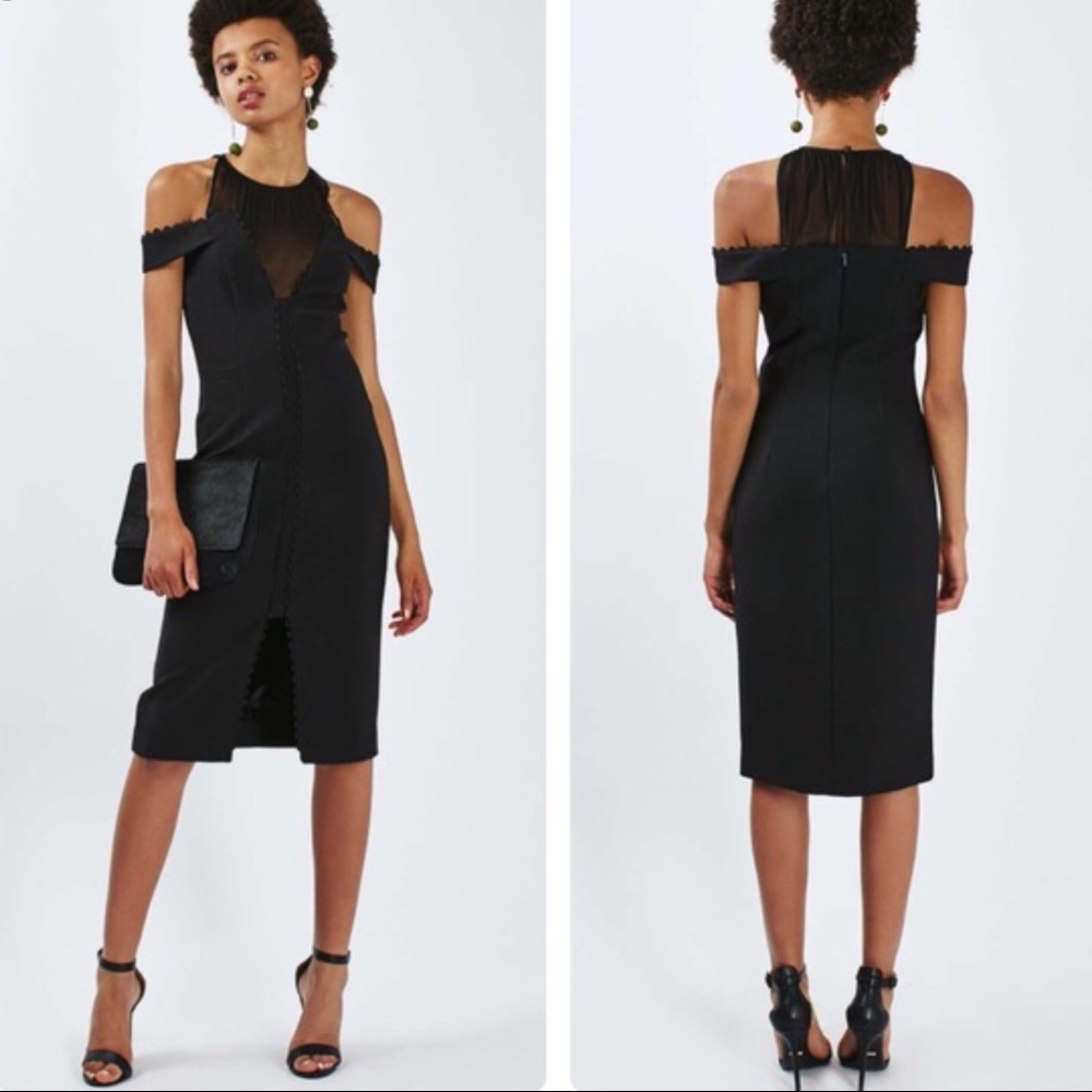 Stunning black cold shoulder midi dress.